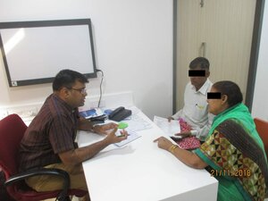 Photo : Dr. Varun with Patient