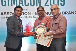 Dr. Rahul Kulkarni being felicitated at GIMACON 2019 - OncoWin Clinic | Aundh, Pune
