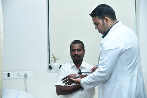 Dr. Rahul Sharma with Patient