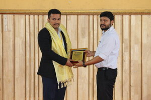 Photo : Dr. Pramod Surve felicitated at conference
