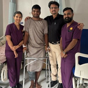 Photo : Happy professional athlete immediate post ACL reconstruction.